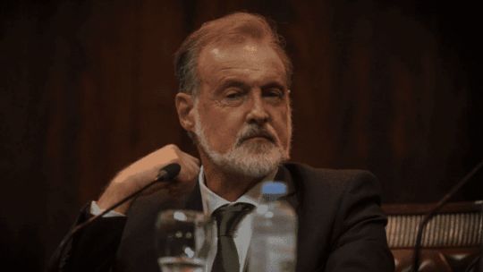 Retratos de Rafael Bielsa y el presidente Javier Milei.